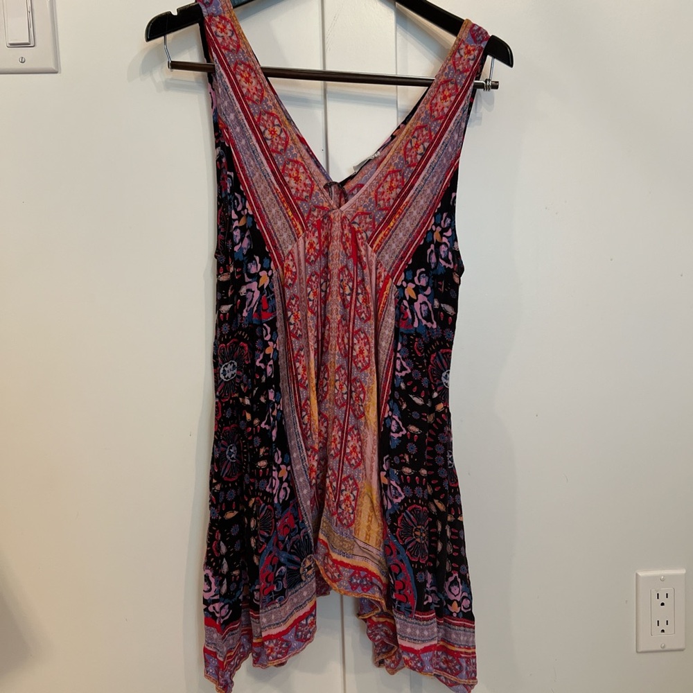 Bohemian Sleeveless Blouse with Vibrant Patterns